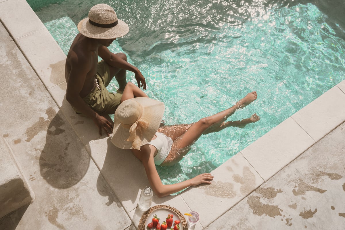 Pool Lifestyle Man and Woman Relaxing in a Pool